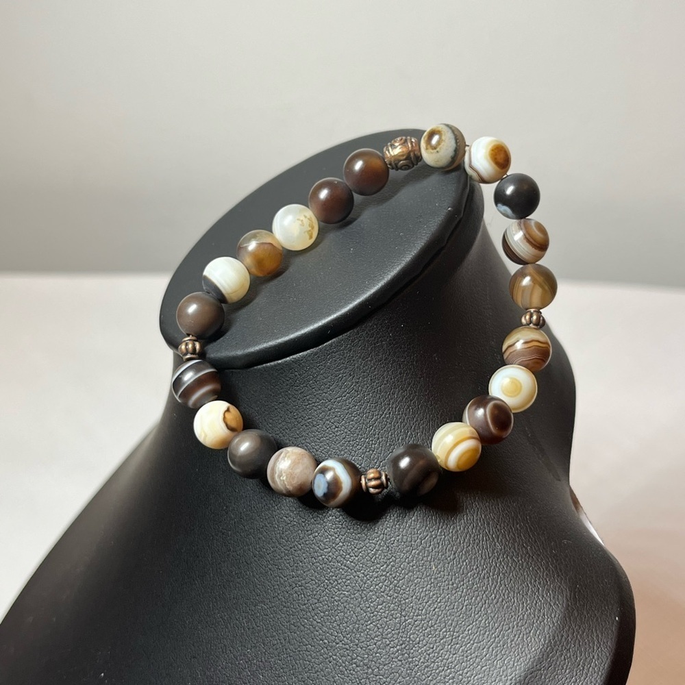 Beaded stretch bracelet. Brown cream tan
Stack em up for a fun boho look